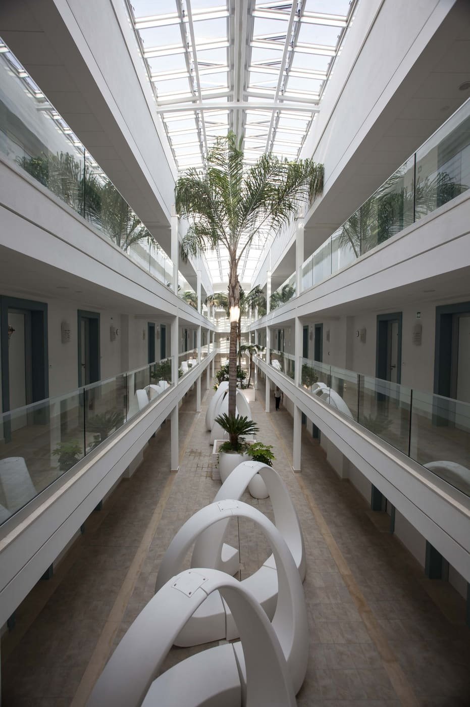 Skylit Atrium — Civil Finishes · Glass Roof · Landscaping